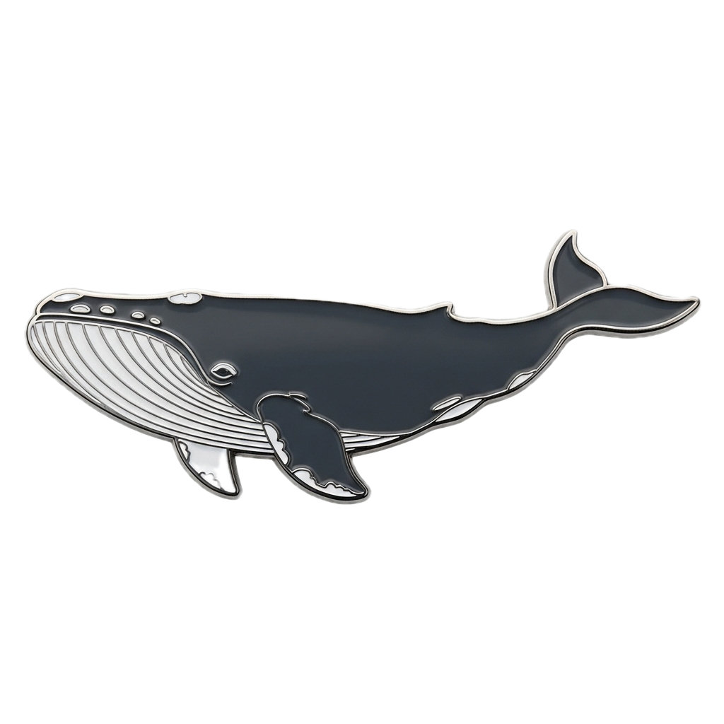 Enamel pin of a whale on a white background